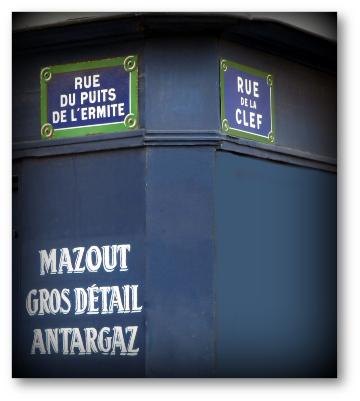 La boutique d'Aux Combustibles Parisiens à l'angle de la rue du Puits de l'Ermite et de la rue de la Clef, Paris 5e