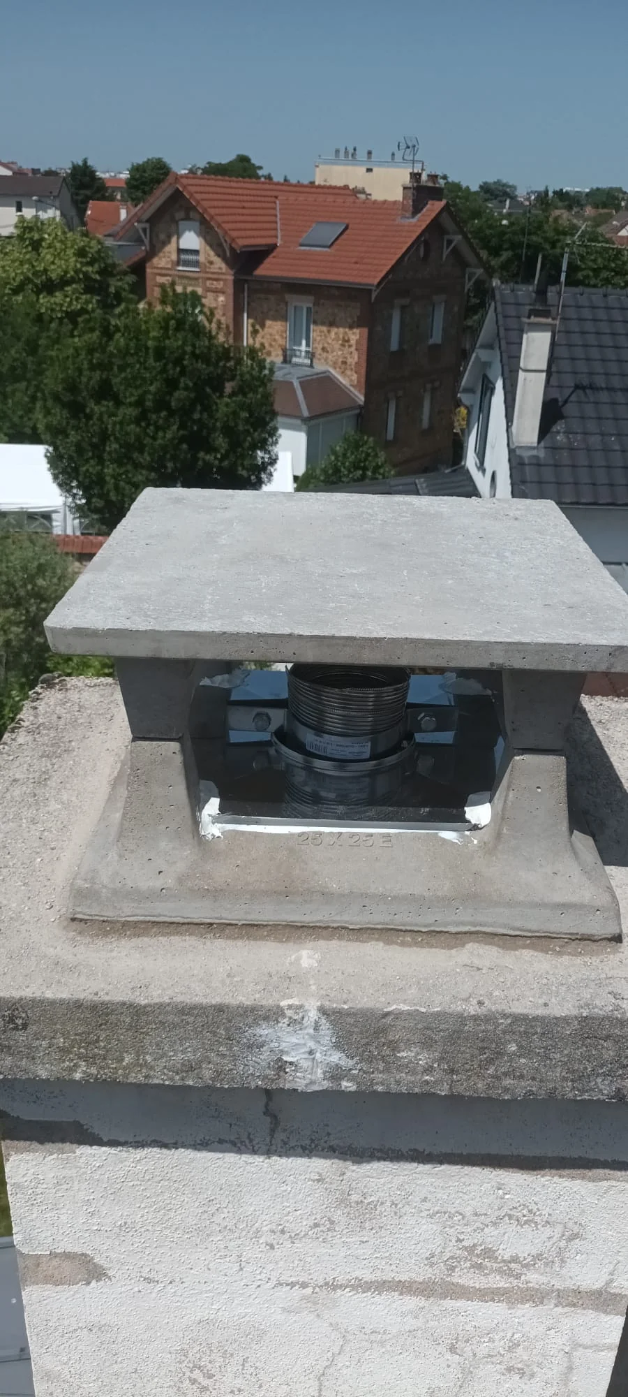 Partie haute du conduit de fumée posé