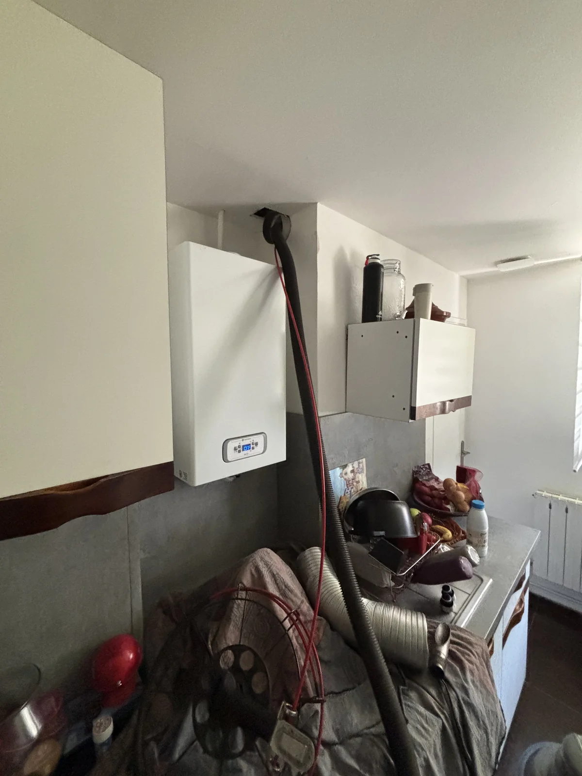 Technicien Terrier Ramonage en intervention sur une chaudière gaz en Seine-et-Marne